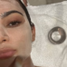 Kim Kardashian with a clay mask on
