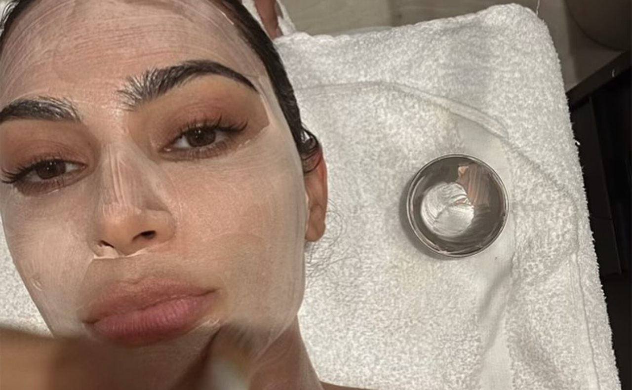 Kim Kardashian with a clay mask on