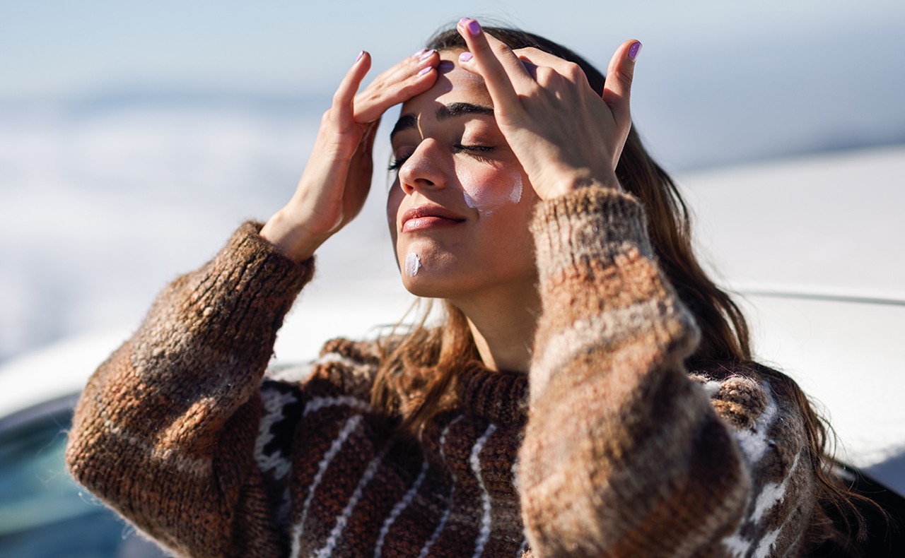 applying sunscreen winter